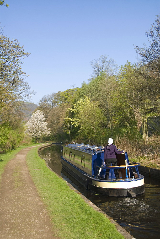 A cruising narrow boat on the Llangollen Canal, Wales, United Kingdom, Europe