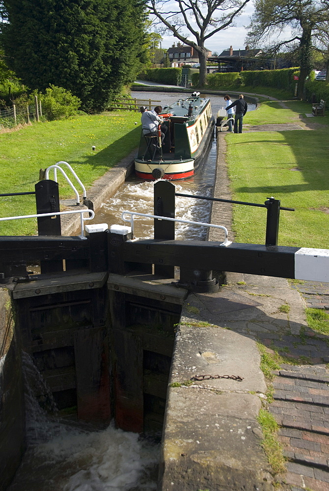 Narrow boat on the Llangollen Canal going through the locks at Grindley Brook, Shropshire, England, United Kingdom, Europe