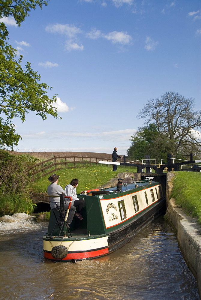 Narrow boat on the Llangollen Canal going through the Locks at Grindley Brook, Shropshire, England, United Kingdom, Europe