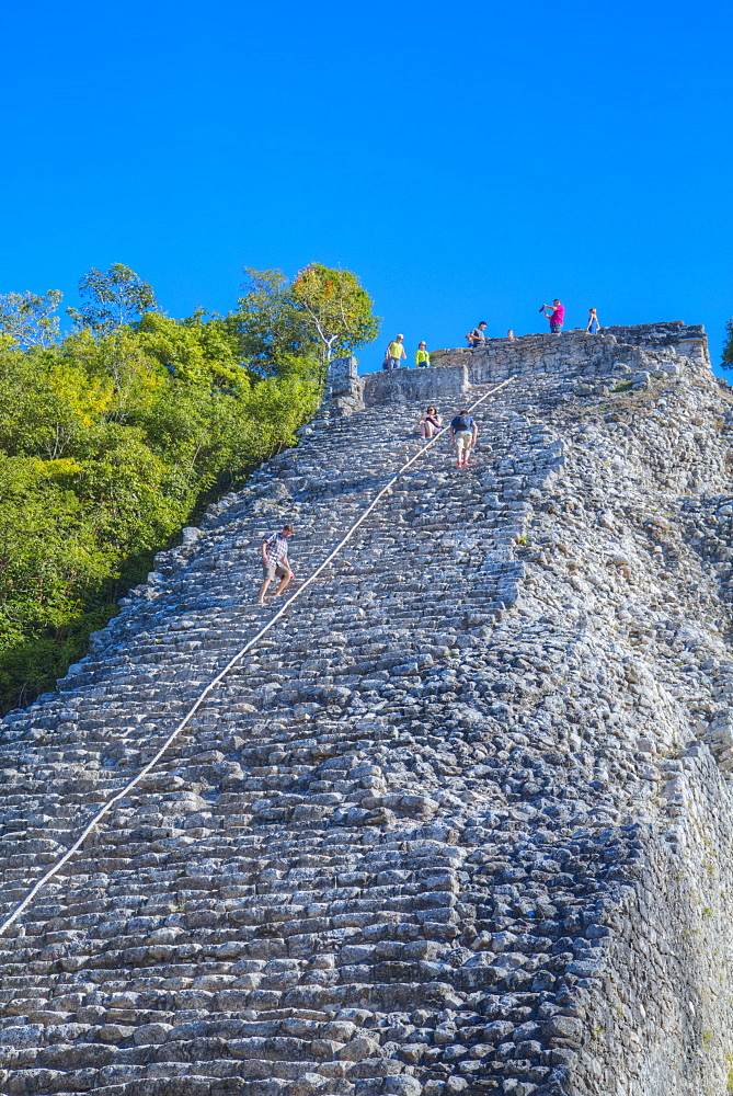 Tourists climbing the Temple, Nohoch Mul Temple, Coba, Quintana Roo, Mexico, North America