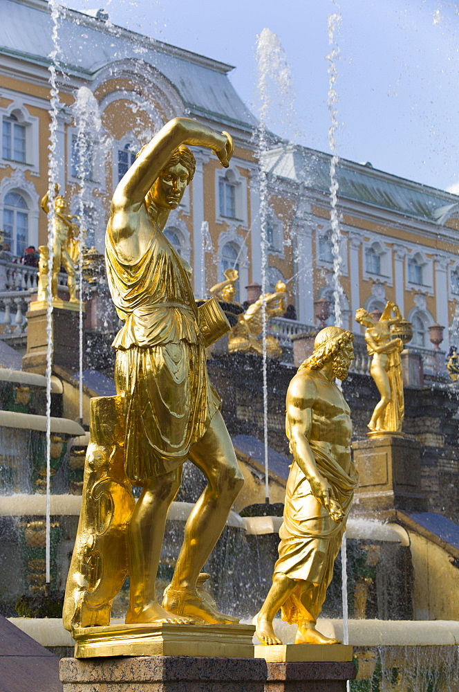 Statue of Jupiter to left in foreground, Great Cascade in the background, Peterhof, UNESCO World Heritage Site, near St. Petersburg, Russia, Europe