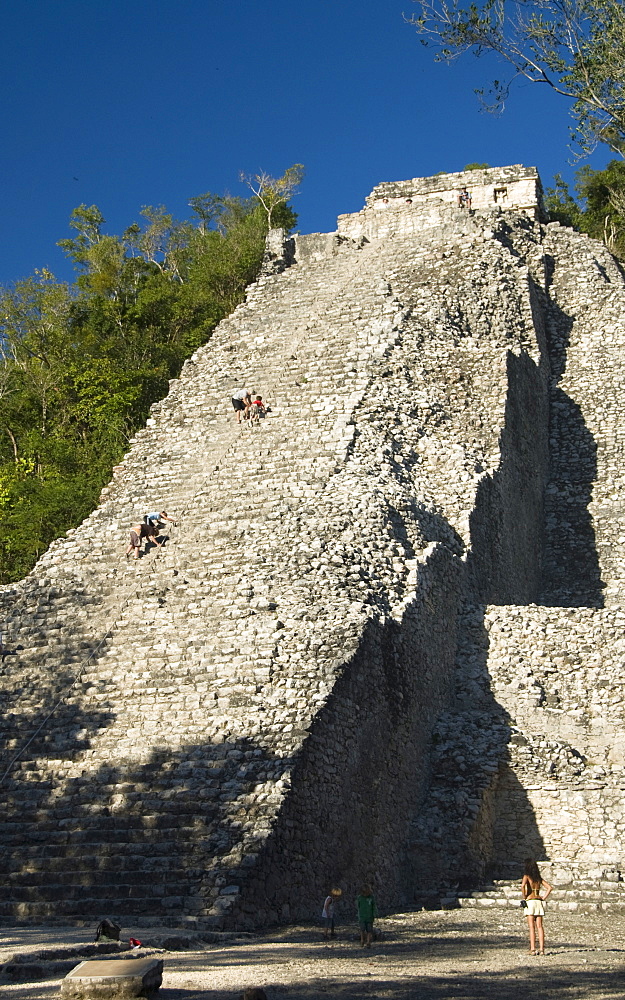 Tourists climbing the stairway, Nohoch Mul (Big Mound), Coba, Quintana Roo, Mexico, North America