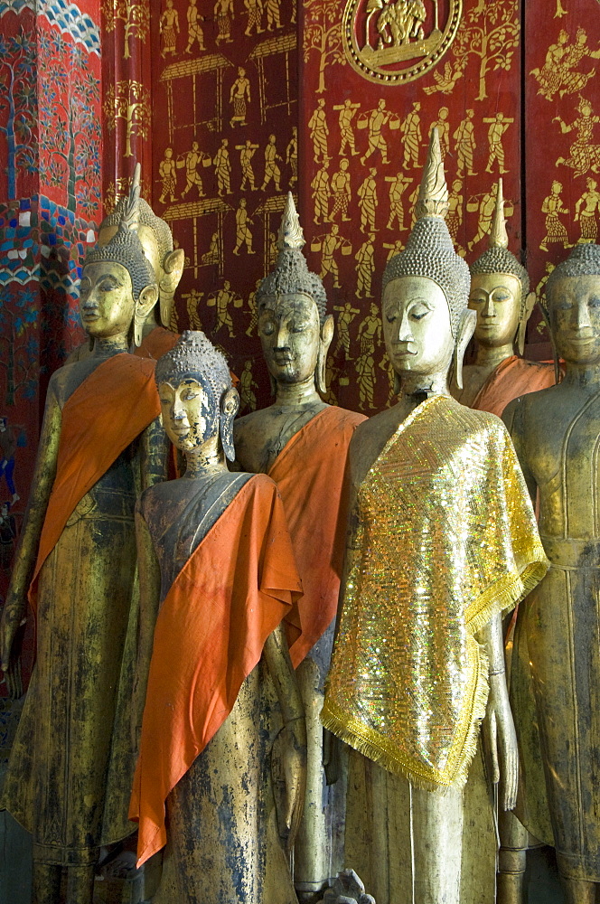 Buddha statues in the Funerary Carriage Hall, Wat Xieng Thong, UNESCO World Heritage Site, Luang Prabang, Laos, Indochina, Southeast Asia, Asia