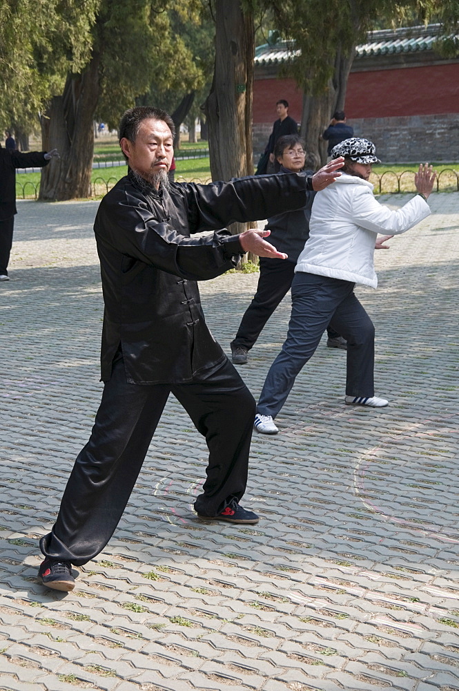 Local people take part in a Tai Chi session in the Temple of Heaven park in Beijing, China, Asia