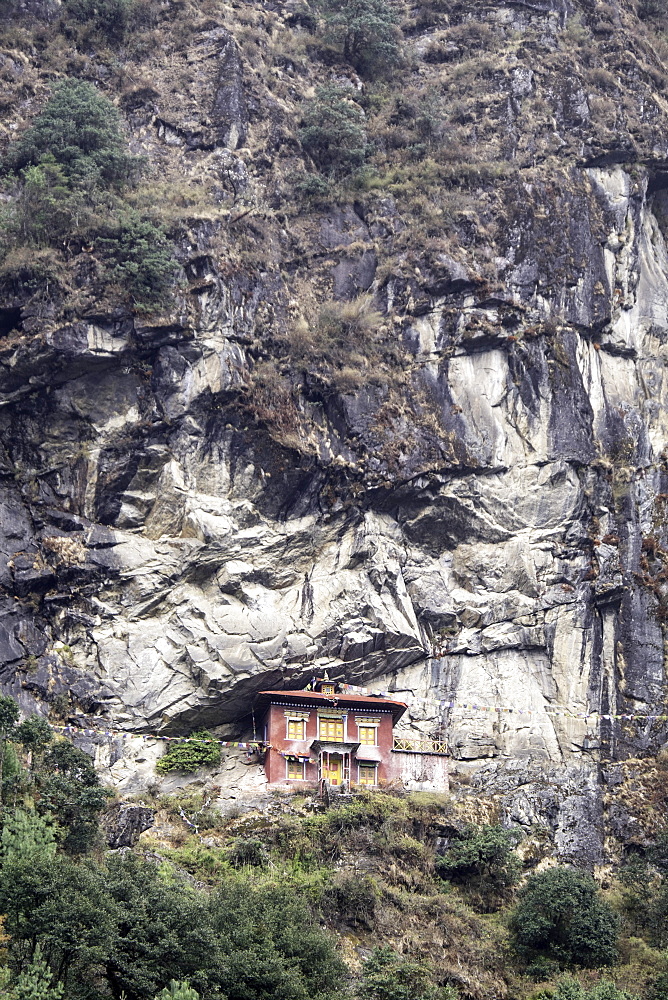 An old religious building built into the side of a cliff in the  Sagarmatha National Park UNESCO World Heritage Site, Himalayas, Nepal, Asia