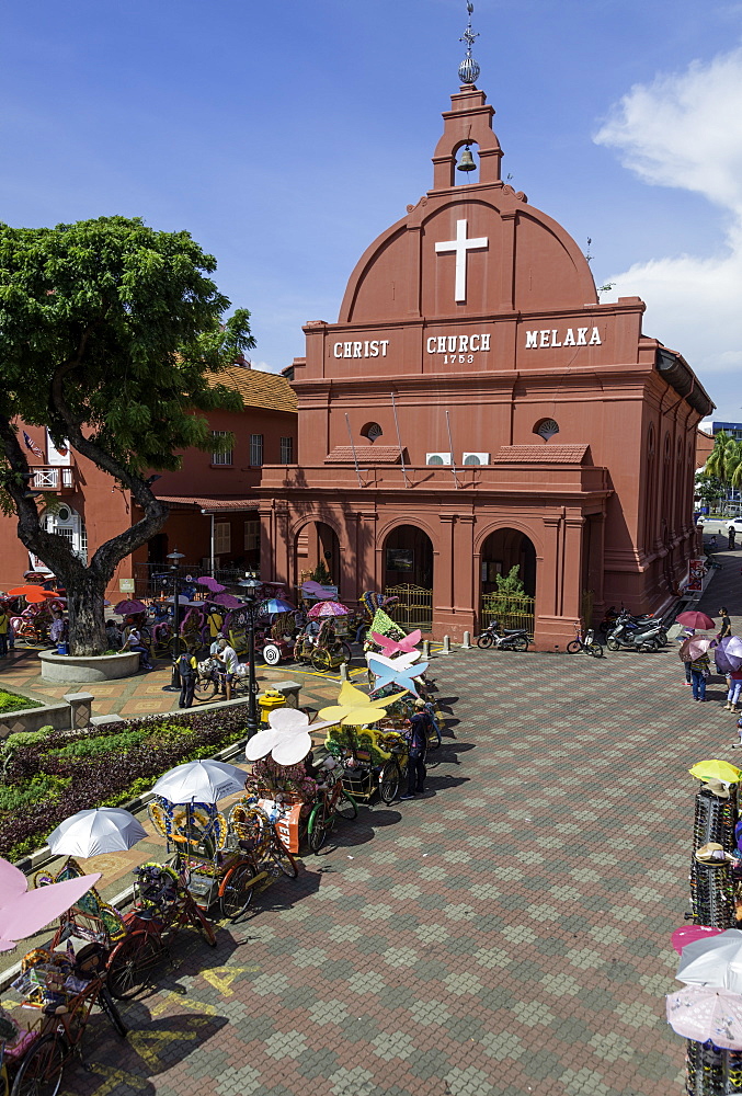 Rickshaws outside Christ Church in the town square, Melaka (Malacca), UNESCO World Heritage Site, Malaysia, Southeast Asia, Asia