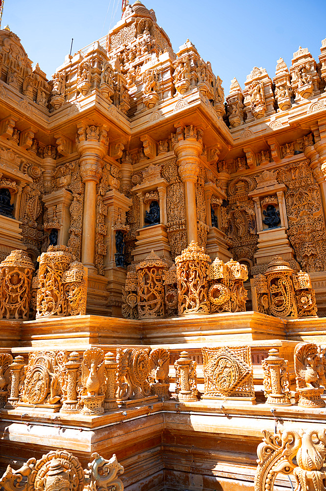 Well maintained golden Taranga Vihar Dham Tirth, a sacred Hindu pilgrimage site, alongside the road between Dhrangadhra and Halyad