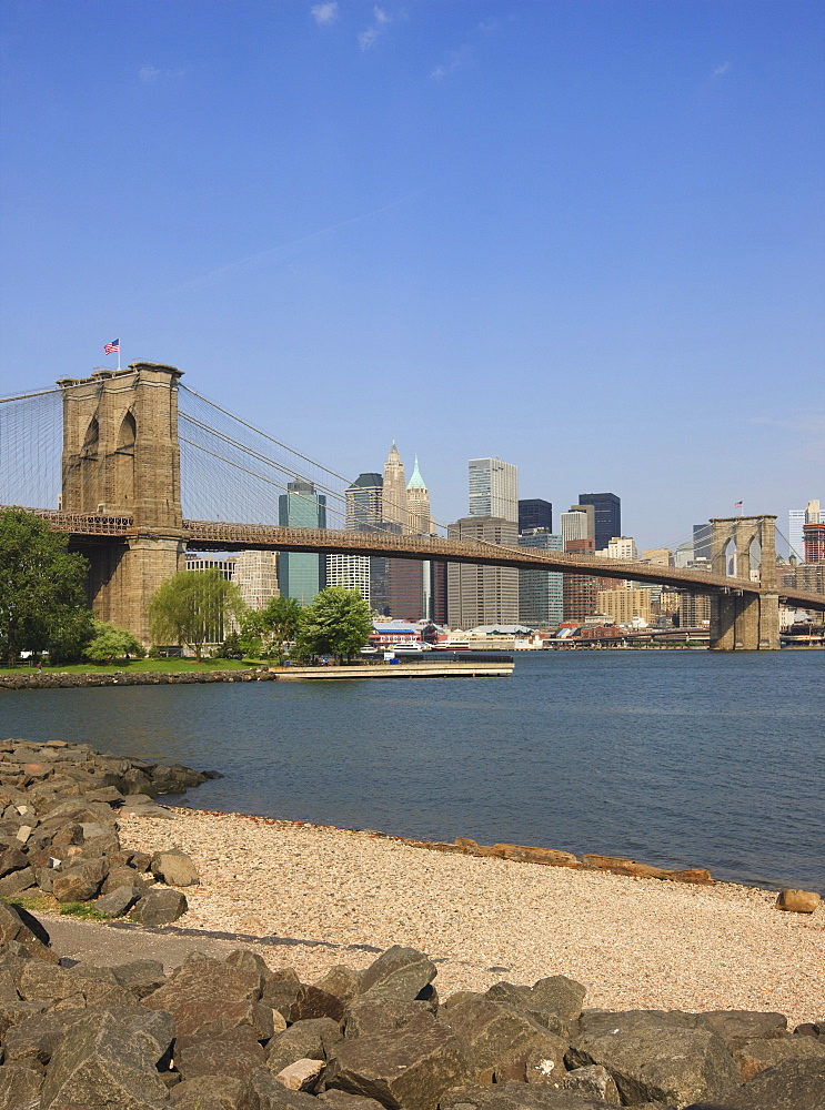 Brooklyn Bridge spanning the East River and Lower Manhattan skyline, from Empire-Fulton Ferry State Park, Brooklyn, New York City, New York, United States of America, North America