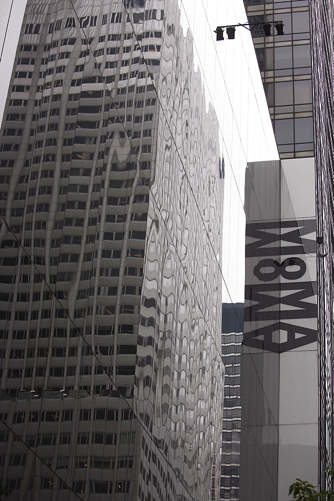 Reflections in the Museum of Modern Art Building, Manhattan, New York City, New York, United States of America, North America