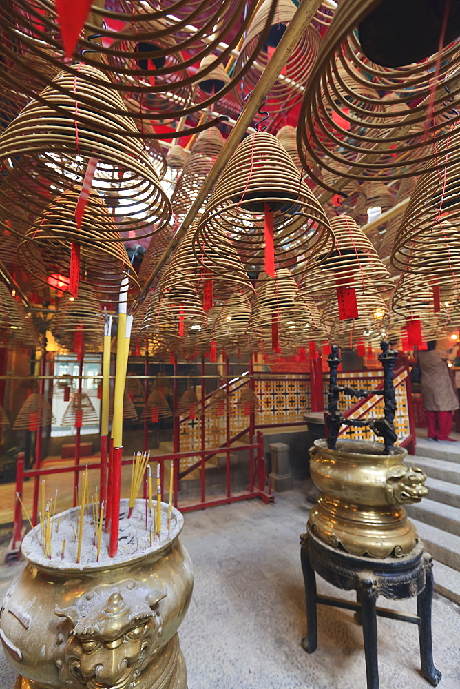 Incense coils hang from the roof of the Man Mo Temple, built in 1847, Sheung Wan, Hong Kong, China, Asia