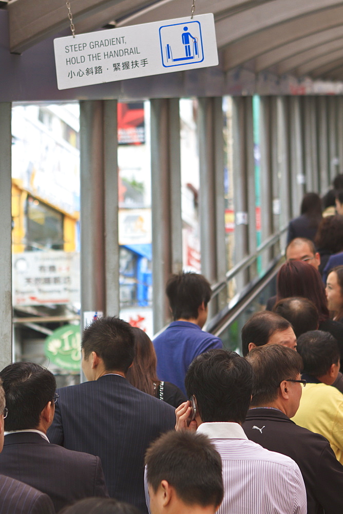 Mid-Levels Escalator, used by thousands of workers every day to get to and from the higher levels to the office buildings of Central, Hong Kong Island, Hong Kong, China, Asia