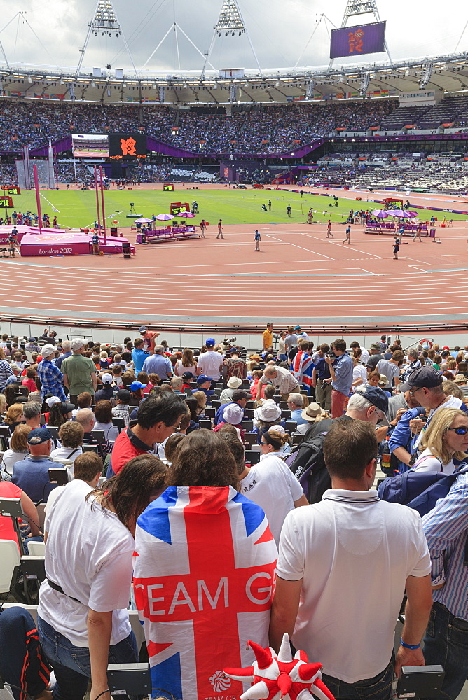 Spectators with Team GB Union flags in the Olympic Stadium, 2012 Olympic Games, London, England, United Kingdom, Europe