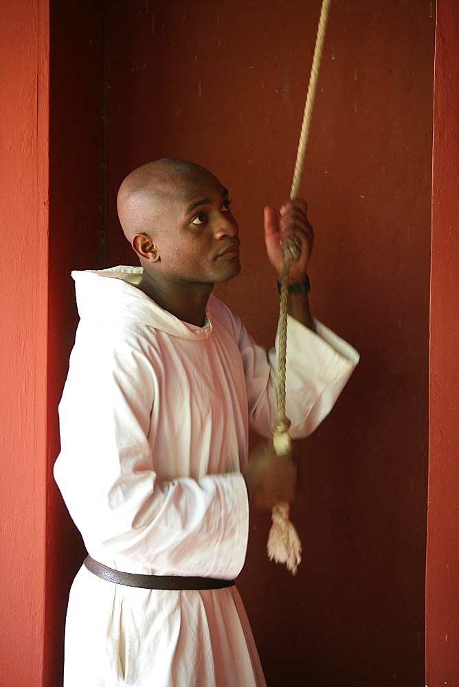 Monk calling to prayer at Keur Moussa Abbey, Keur Moussa, Senegal, West Africa, Africa