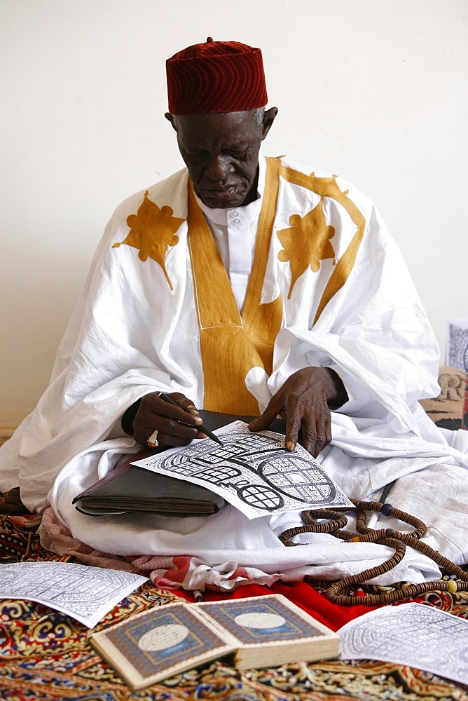 Marabout at work, Mbour, Thies, Senegal, West Africa, Africa