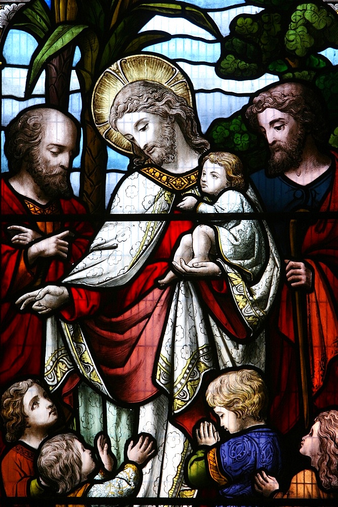 Stained glass window depicting Jesus welcoming children, Billingshurst, Sussex, England, United Kingdom, Europe