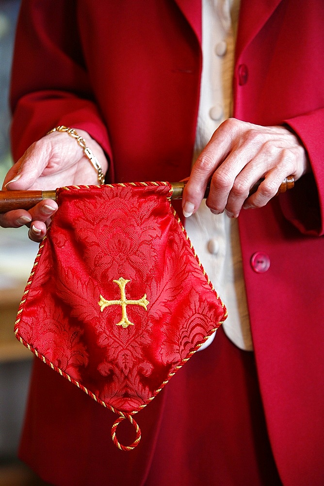 Collection during Sunday service in a Reformed church, London, England, United Kingdom, Europe