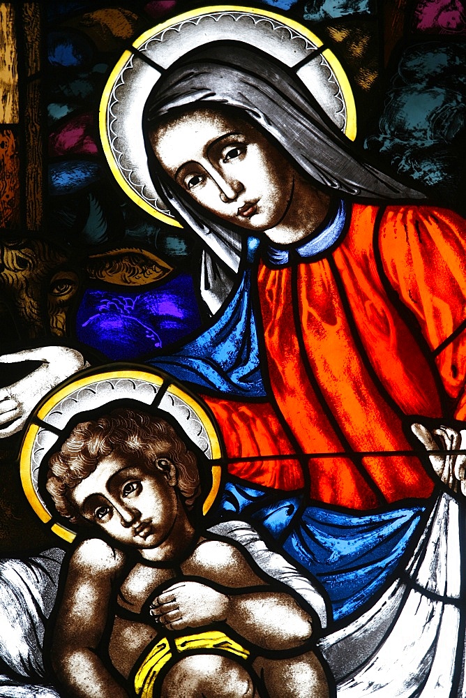 Stained glass window of Virgin and Child, St. Mary's church, New York, United States of America, North America