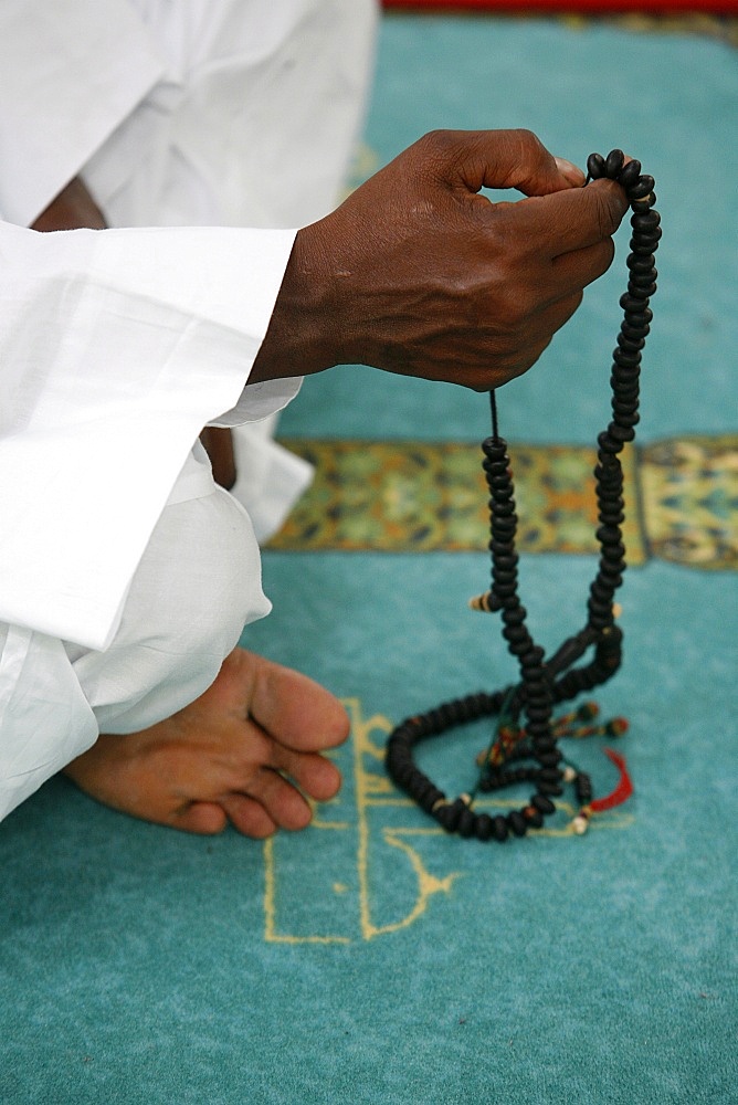 Muslim with prayer beads, Lyon, Rhone Alpes, France, Europe