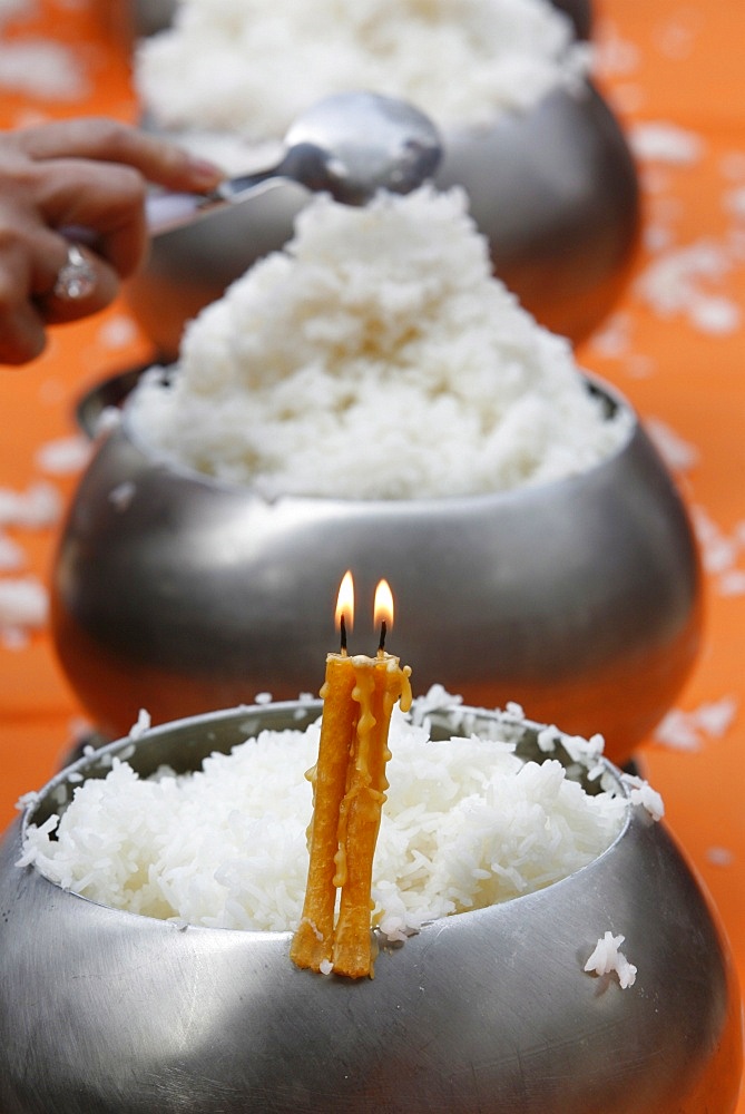 Rice offering at the Vincennes Buddhist Pagoda, Paris, France, Europe