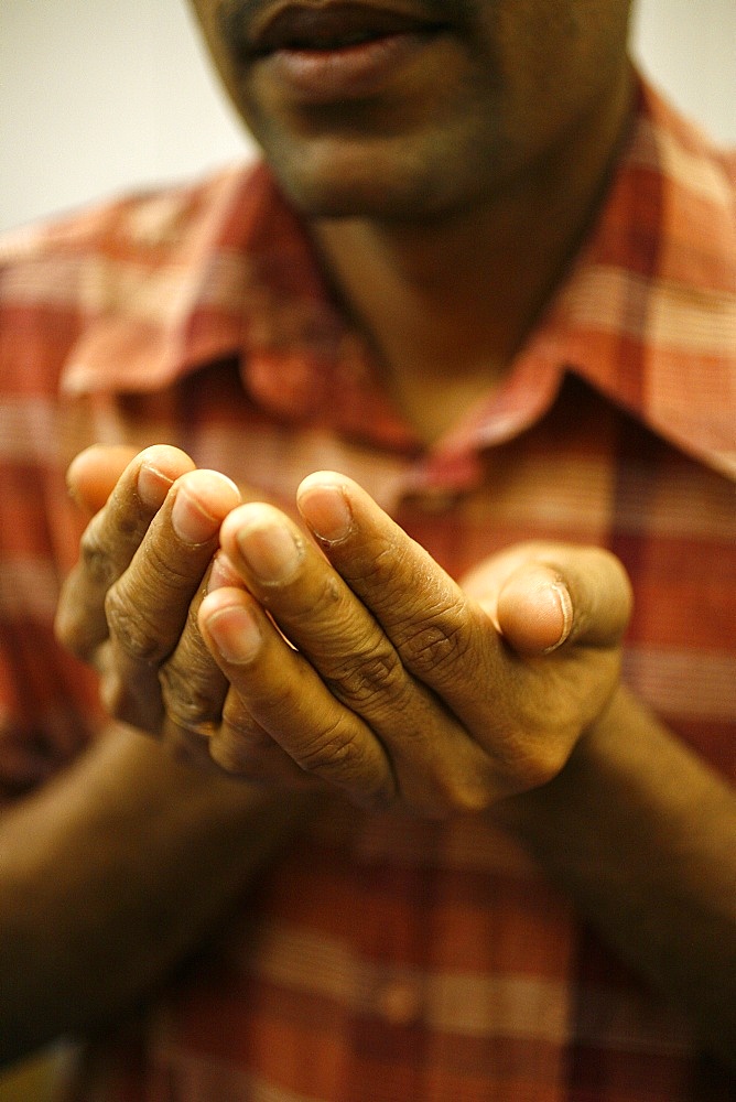 Hindu prayer in a Sri Lankan temple, Paris, France, Europe