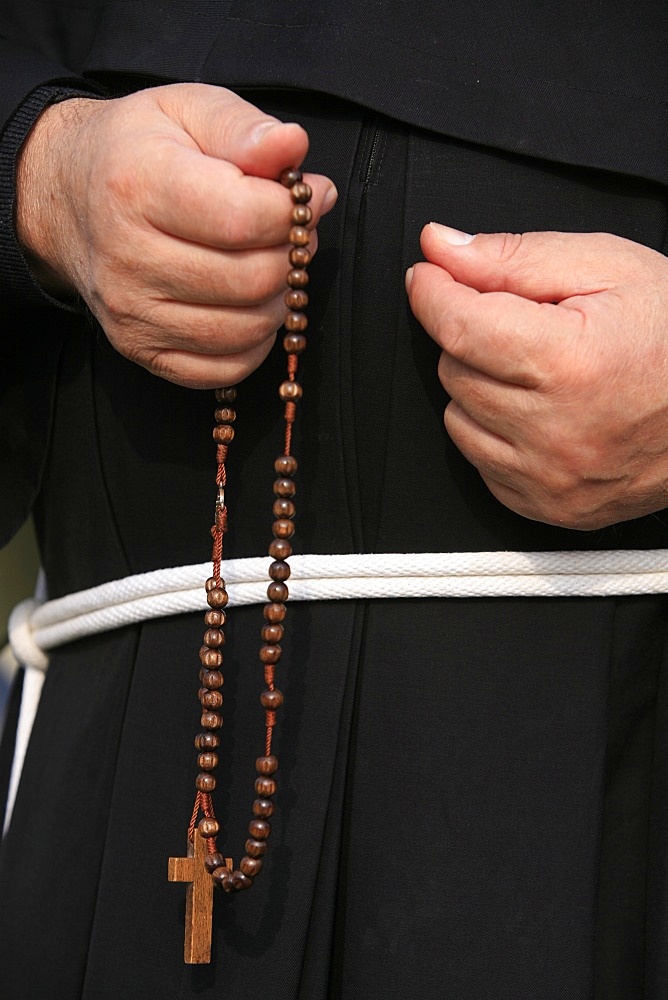 Monk holding rosary, Rome, Lazio, Italy, Europe