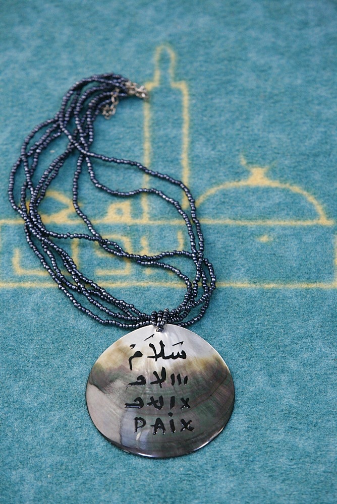 Pendant inscribed with peace in Arabic and French, Lyon, Rhone, France, Europe