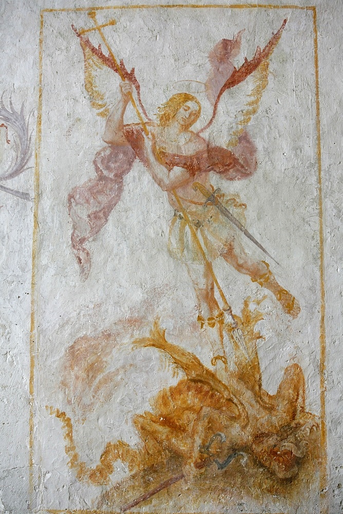 A 15th century fresco depicting St. Michael slaying a dragon, La Ferte Loupiere, Yonne, France, Europe