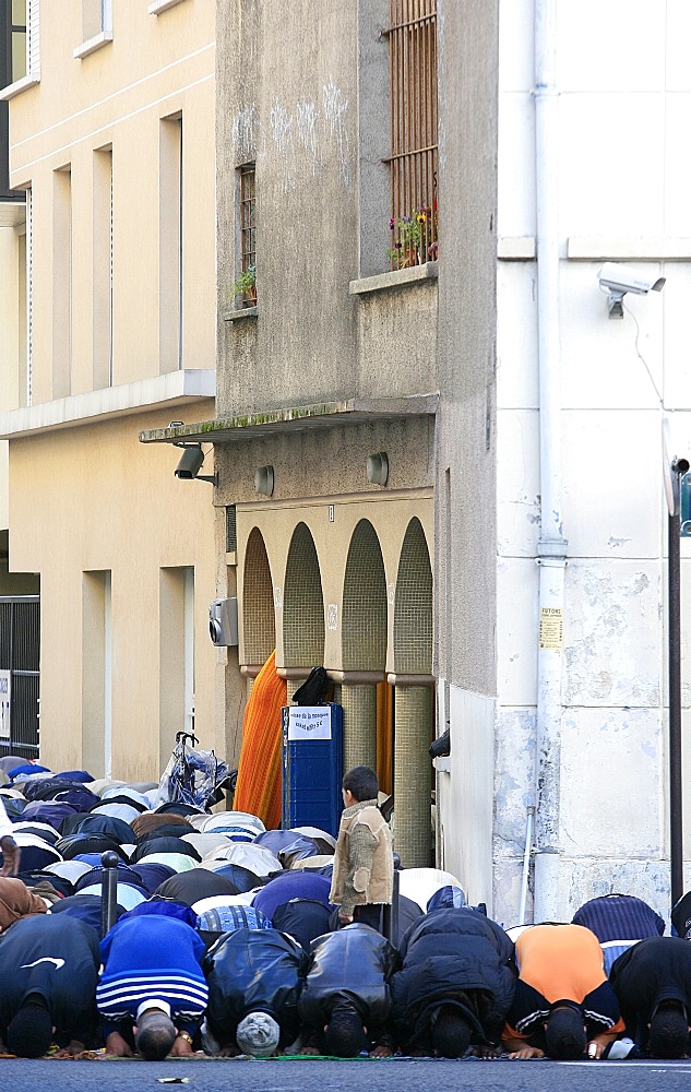 End of Ramadan prayers outside a mosque, Paris, France, Europe