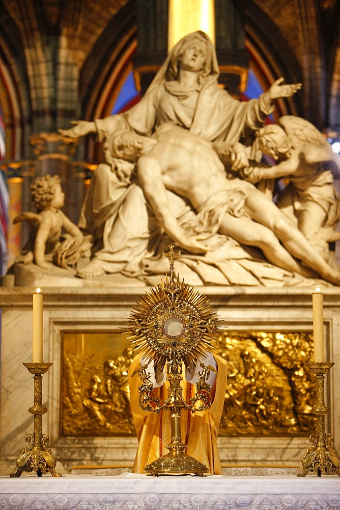 Eucharist adoration in Notre Dame de Paris cathedral, Paris, France, Europe