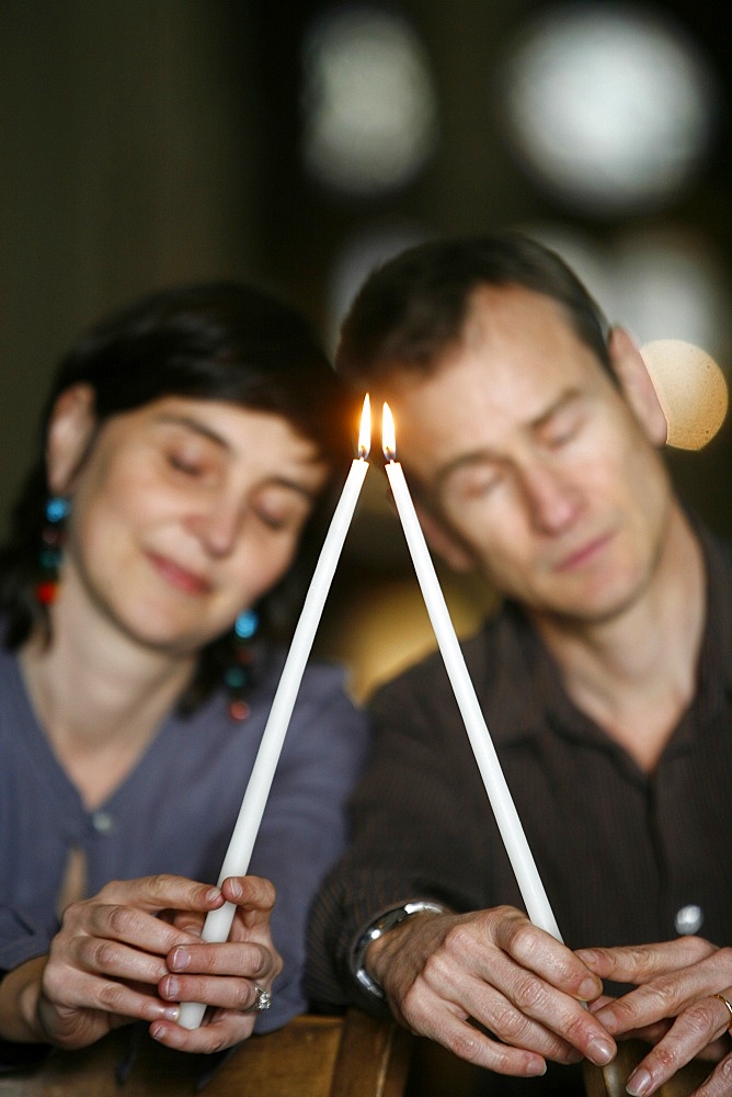 Couple in church, Paris, France, Europe