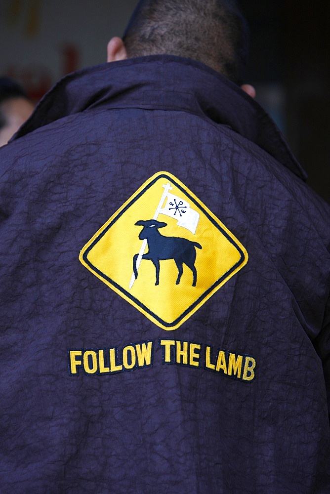 Follow the lamb on a Catholic's jacket, Sydney, New South Wales, Australia, Pacific