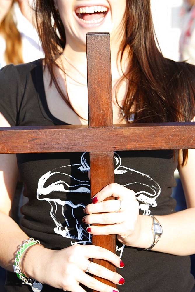 Young Catholic girl with a cross, Sydney, New South Wales, Australia, Pacific