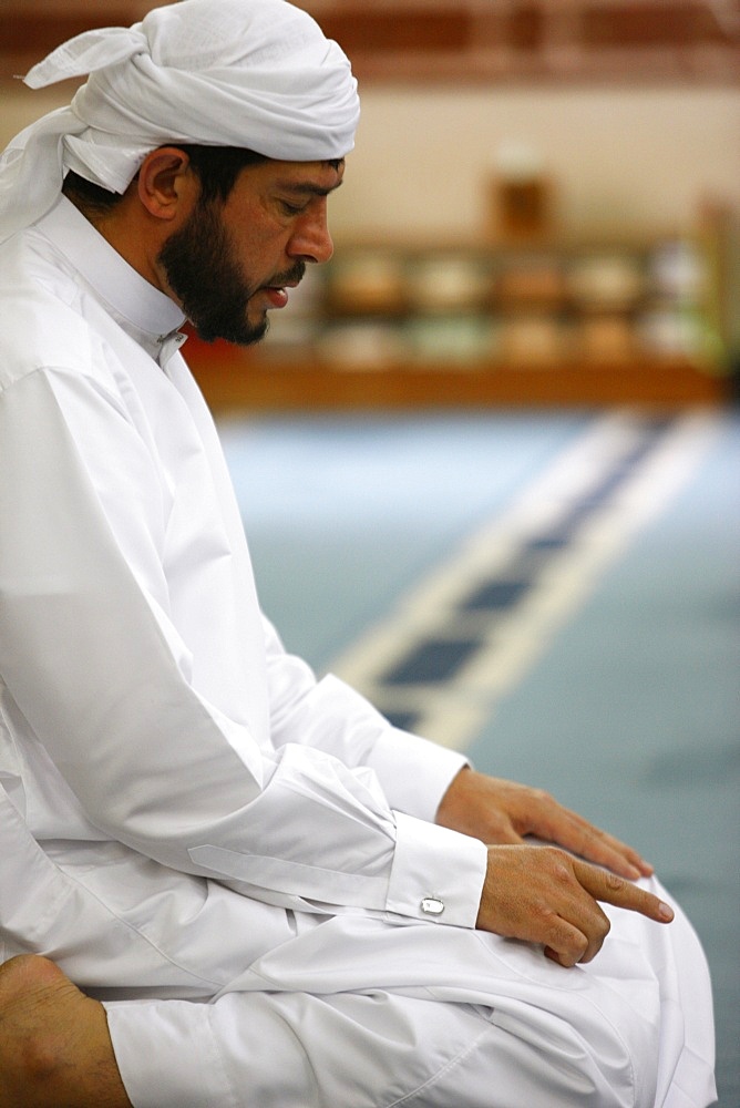 Praying Muslim,  Jumeirah mosque, Dubai, United Arab Emirates, Middle East