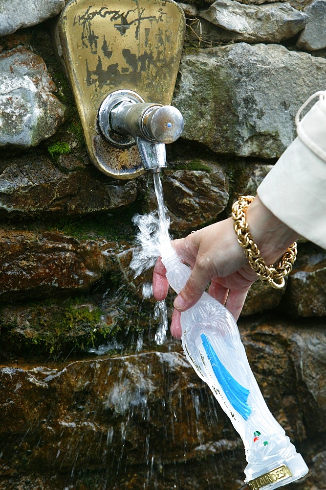 Lourdes holy water, Lourdes, Hautes Pyrenees, France, Europe