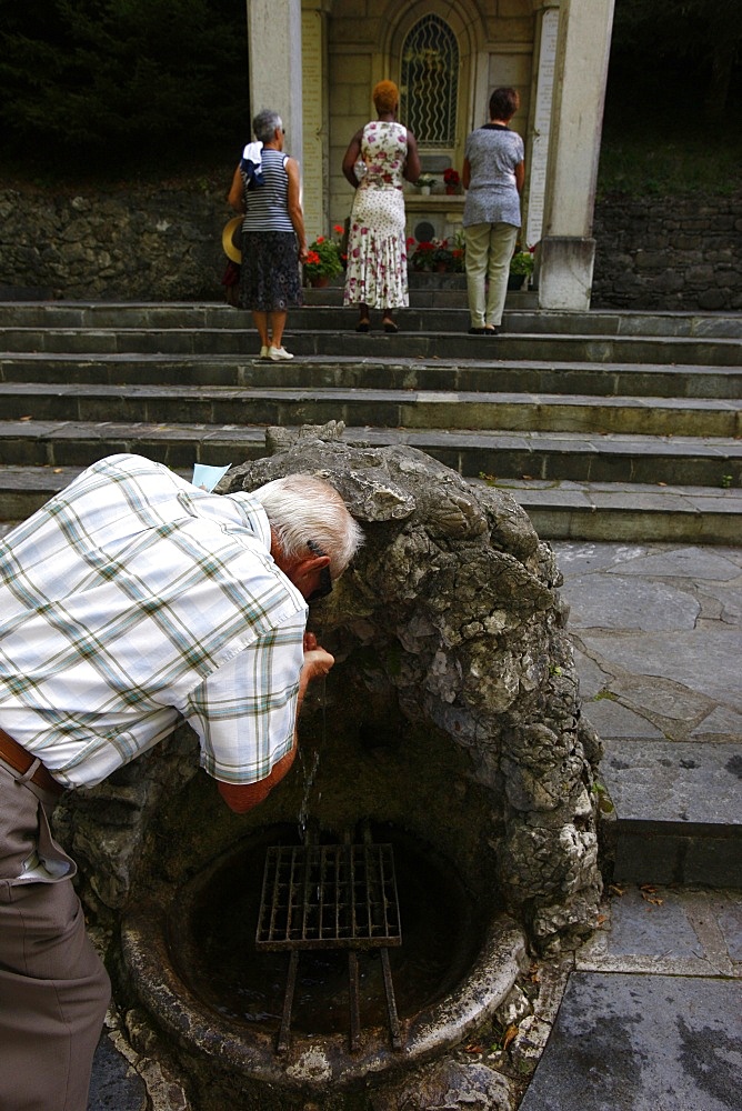 Well at la Benite Fontaine sanctuary, La Roche-sur-Foron, Haute Savoie, France, Europe