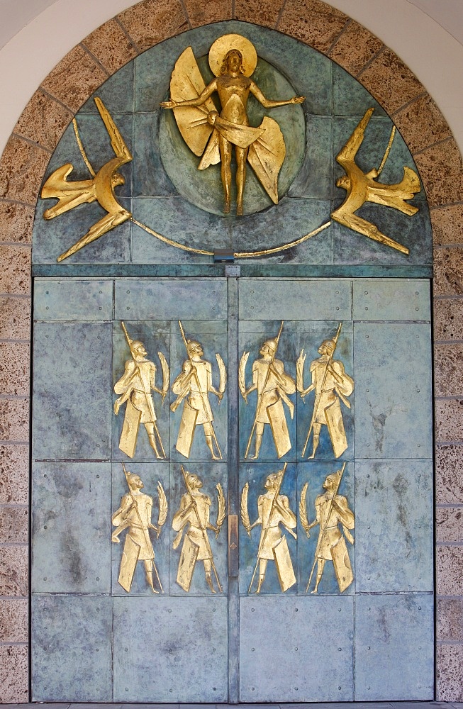 Ascension of Christ and the Theban soldiers by Philippe Kaeppelin on basilica door, Saint-Maurice Abbey, Saint-Maurice, Valais, Switzerland, Europe