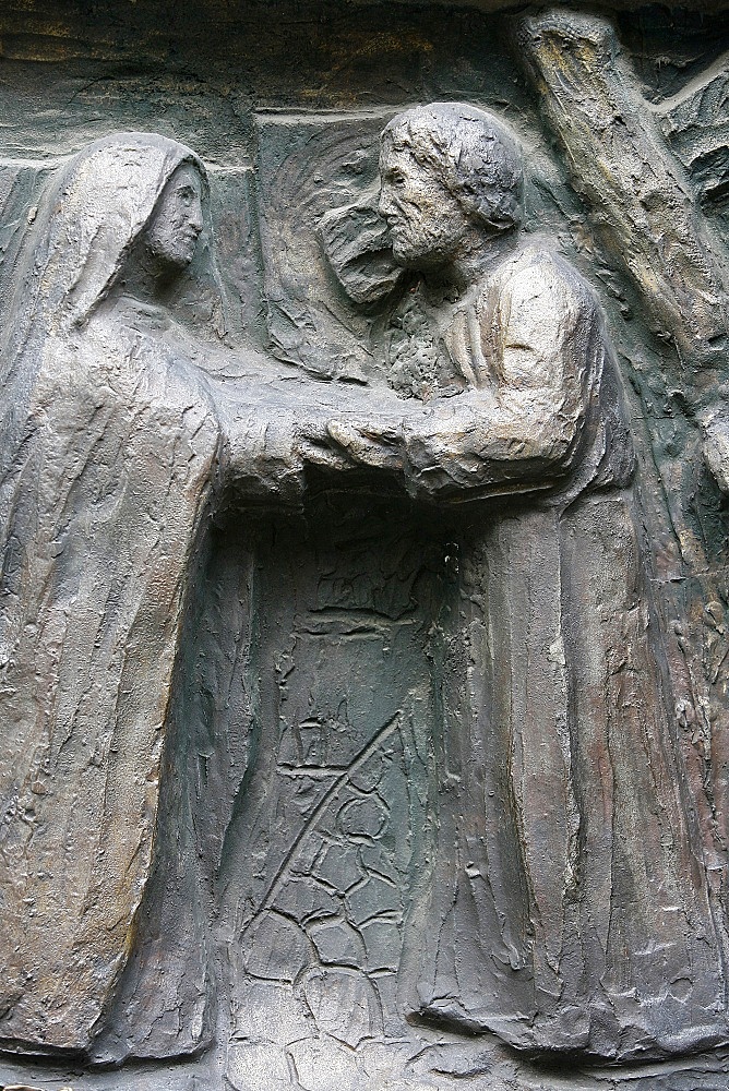 Sculpture of Jesus meeing his mother on the Via Dolorosa on the Notre Dame door, Saint-Pierre de Montmartre church, Paris, France, Europe