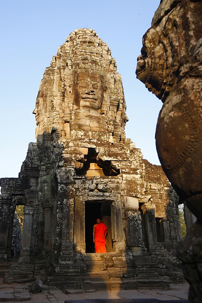 Monk at the Bayon temple, Angkor Thom Complex, Angkor, UNESCO World Heritage Site, Siem Reap, Cambodia, Indochina, Southeast Asia, Asia