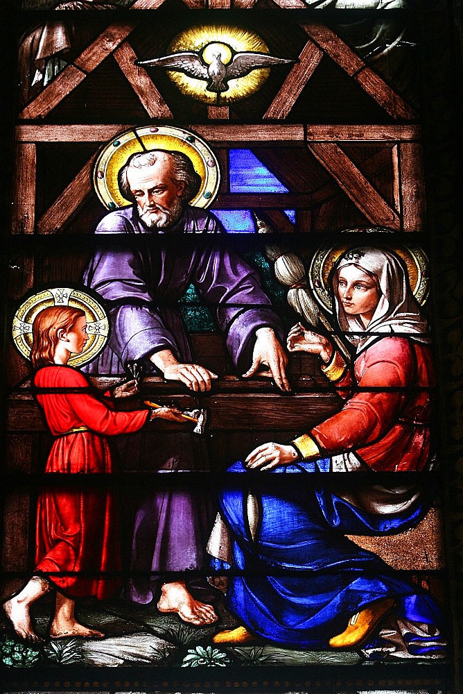 Stained glass window of the Holy Family, Our Lady of Geneva basilica, Geneva. Switzerland, Europe