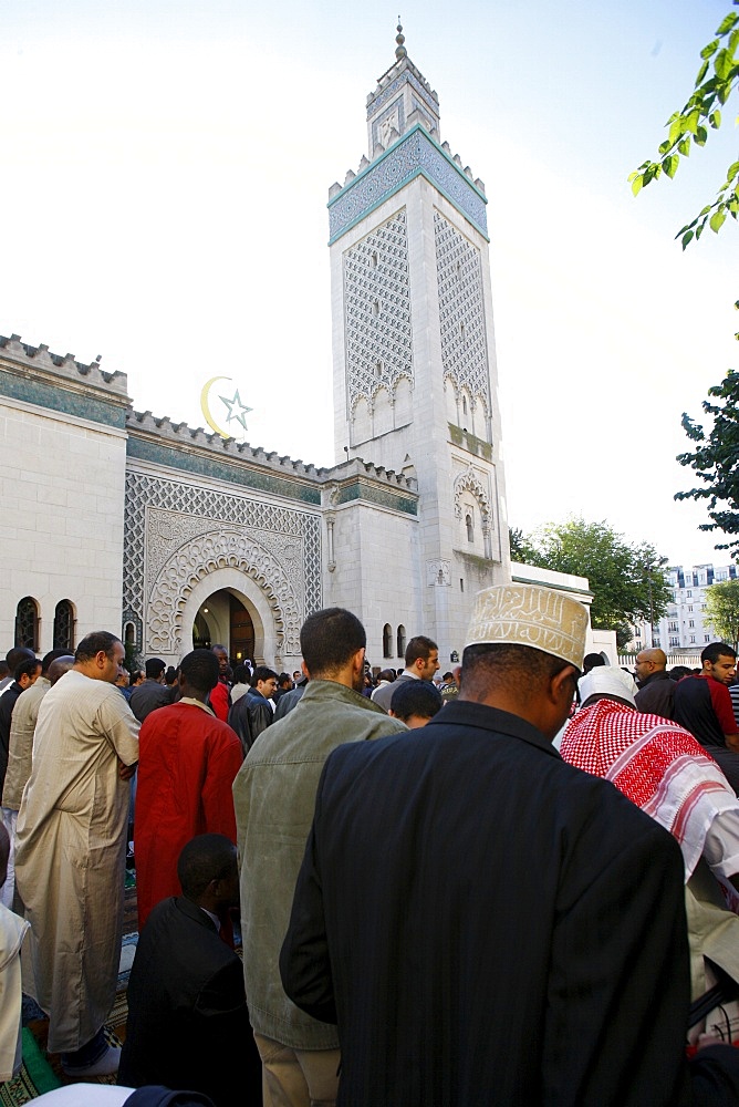 Muslims praying outside the Paris Great Mosque on Aid El-Fitr festival, Paris, France, Europe