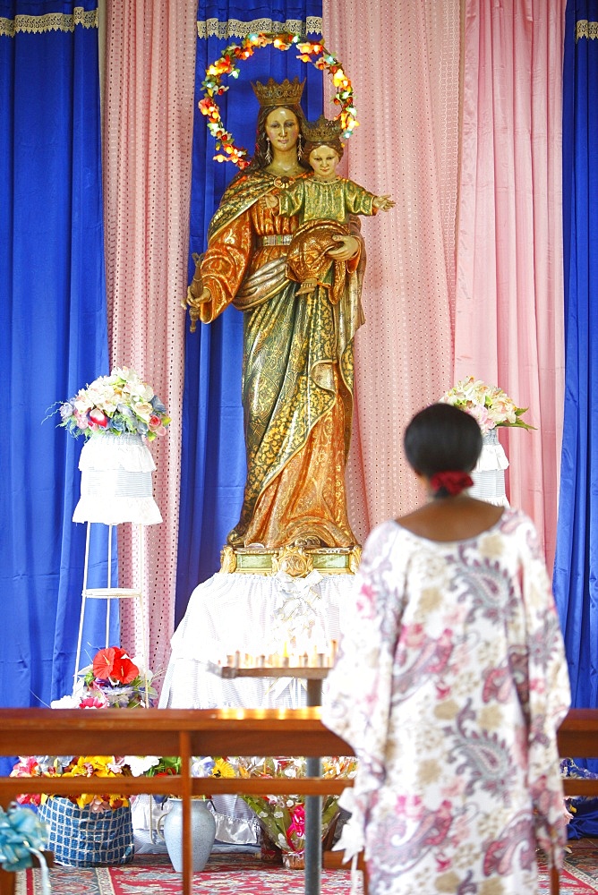 Prayer to Mary in an African church, Togo, West Africa, Africa