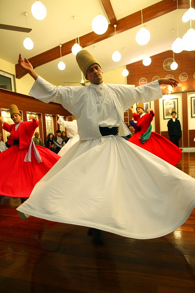 Whirling dervish performance in Silvrikapi Meylana cultural center, Istanbul, Turkey, Europe