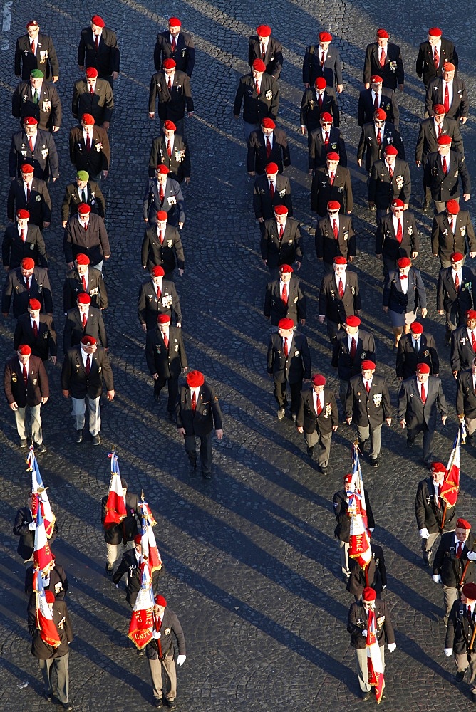 War veterans marching to the Arc de Triomphe, Paris, France, Europe