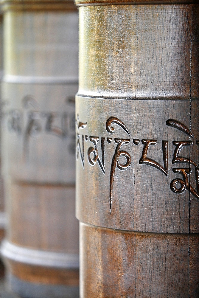 Prayer wheels in Dhagpo Kagyu Ling Tibetan Buddhist monastery, Saint-Leon sur Vezere, Dordogne, France, Europe