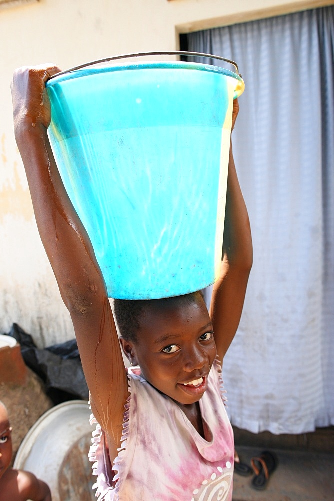 African child sponsored by an NGO, Lome, Togo, West Africa, Africa