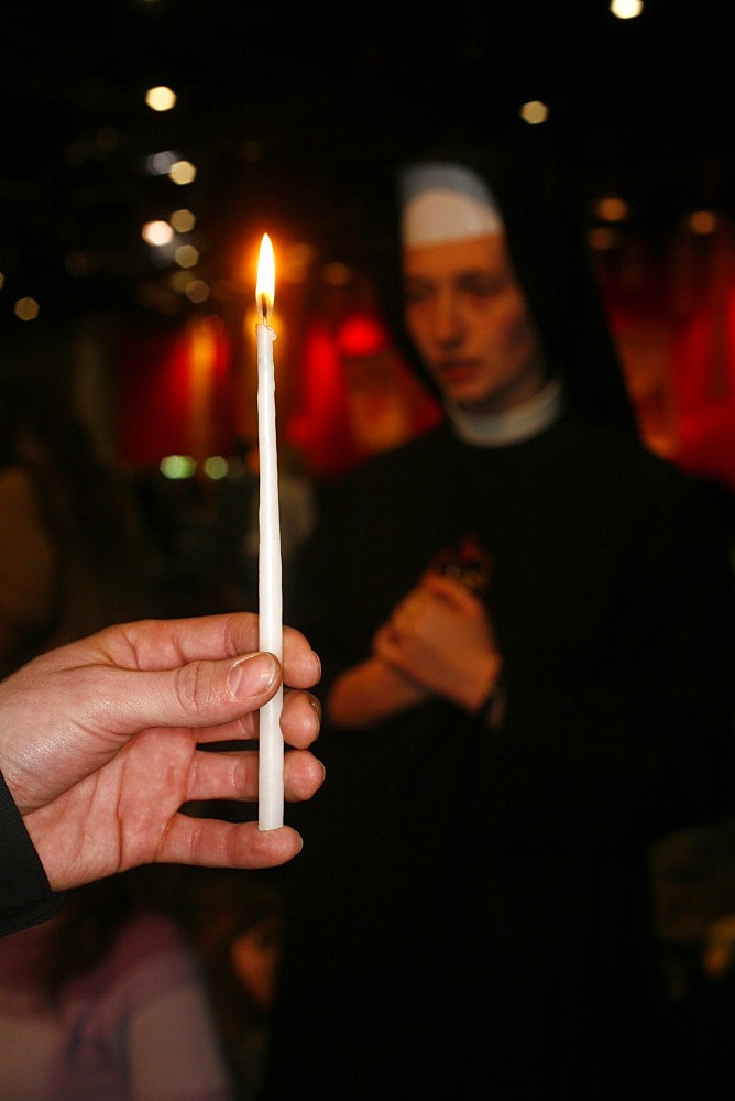 Prayer at Taize meeting, Geneva, Switzerland, Europe