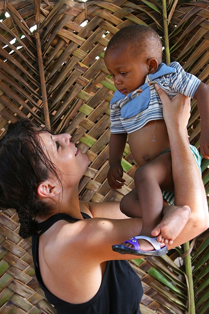 Woman with an African child, Lome, Togo, West Africa, Africa