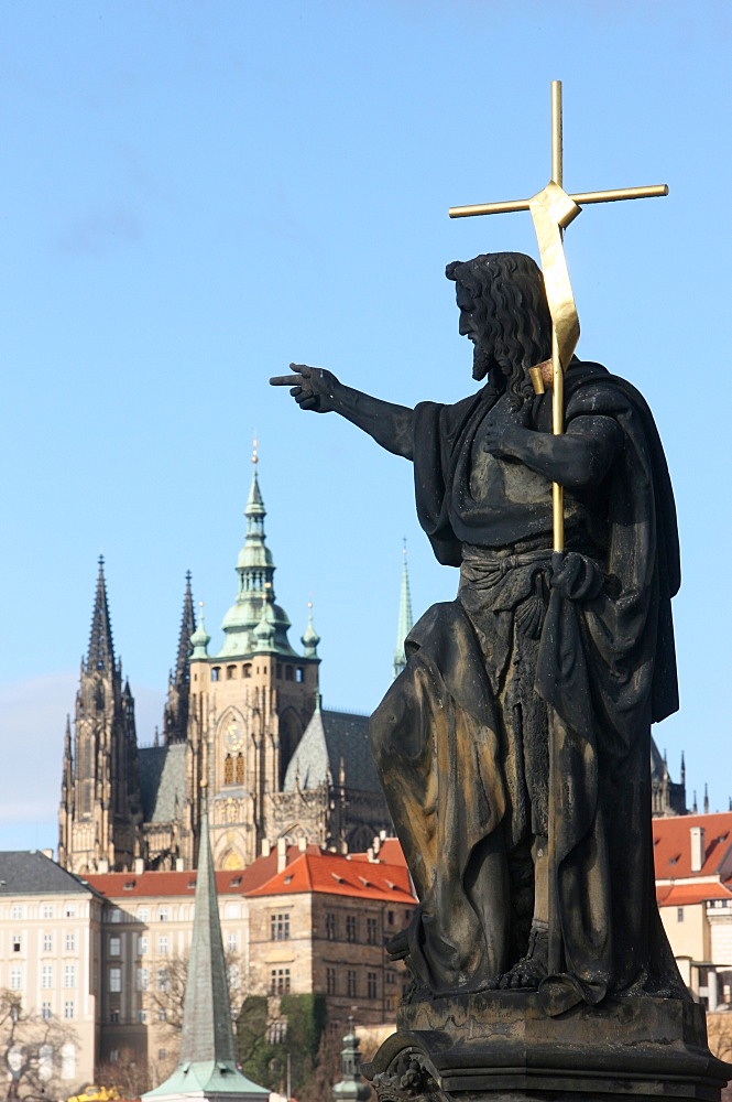 St. John the Baptist sculpture on Charles Bridge, UNESCO World Heritage Site, Prague, Czech Republic, Europe