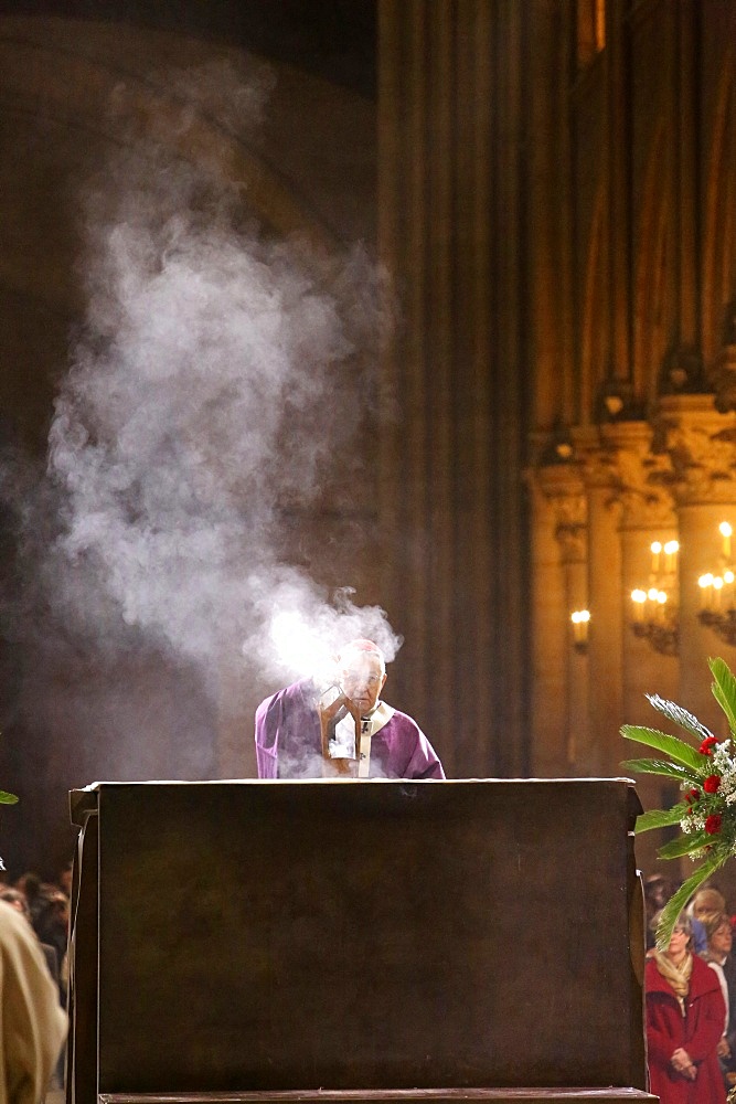 Archbishop censing the altar of Notre Dame Cathedral, Paris, France, Europe