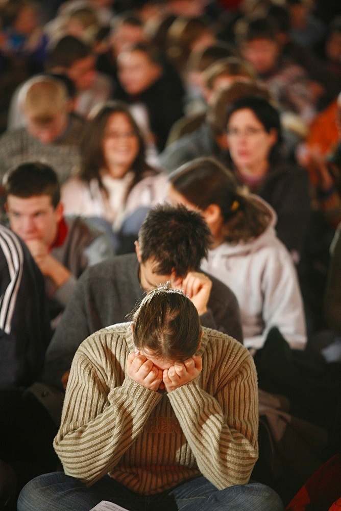 Prayer at Taize meeting, Geneva, Switzerland, Europe